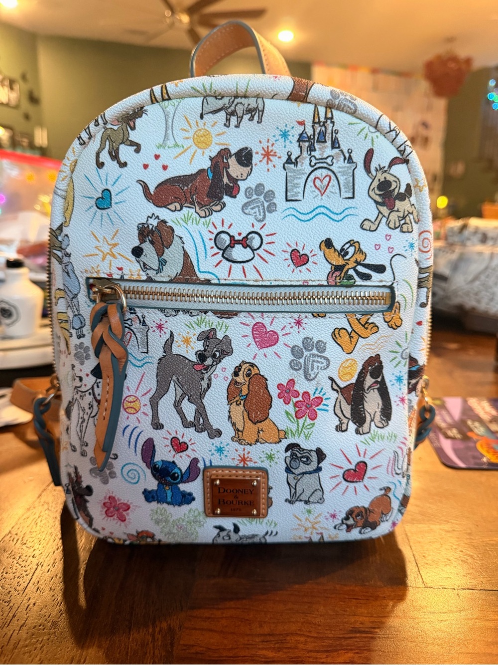 Dooney & Bourke Cream Disney Dogs Mini Backpack with Multicolor Prints